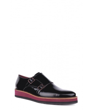 Лачени обувки в черен цвят с катарами от Gino Rossi